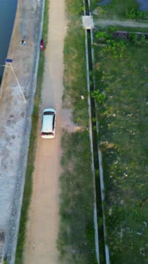 Aerial View of Car on Dirt Road