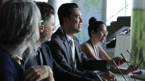 Business People Discussing Ideas at a Conference