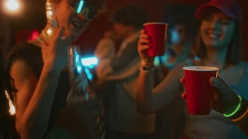 Young Adults Toasting at Party in an Urban Setting