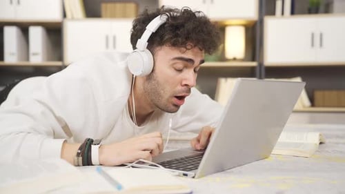 Frustrated male student.