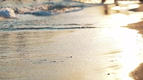 Blue Sea Wave White Foam Golden Sand Beach Turquoise Ocean Water and Waves From Seashore Close Up