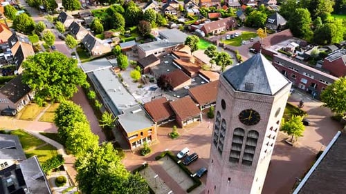 Flight around the hexagon clock tower freestanding near the Saint Lawrence Church.