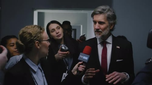 American Politician Walks in Corridor of Government Building Answers Press Questions