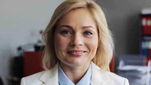 Smiling Woman in Business Attire Close Up