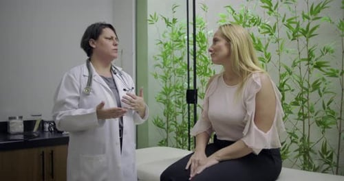 Doctor Discussing Health with Patient in Modern Office