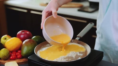 Preparing Omelet in the Kitchen