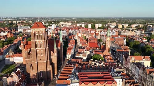 Aerial Video Shot By Drone Over the Historic Tourist Center of Gdansk the City Hall and the