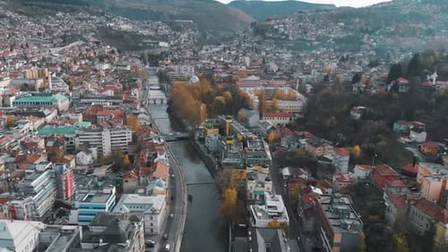A drone shot from the Bosnian capital Sarajevo. In the middle you see the river Miljacka. Shot durin
