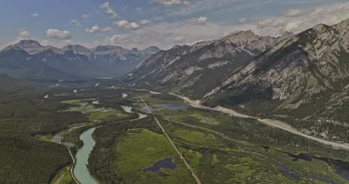 Banff AB Canada Aerial v42 drone flyover capturing the pristine natural environment, winding course