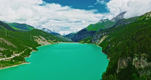 A Swiss Lake with Clear Turquoise Water Establishing Shot of Switzerland Aerial View of Swiss