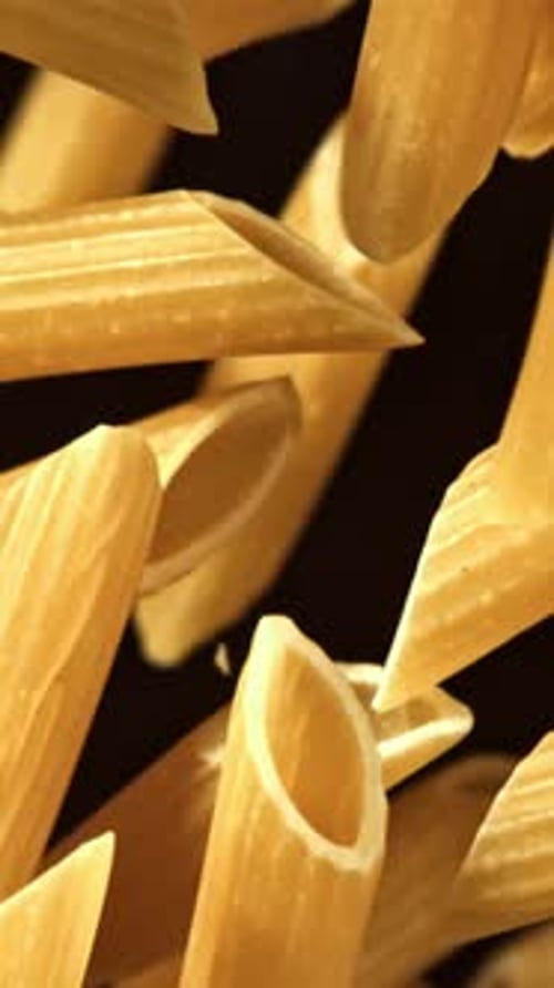 Super Slow Motion Flying Dry Penne Pasta Filmed on a Highspeed Camera at 1000 Fps