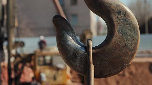 Close Up of Crane Hook at Construction Site