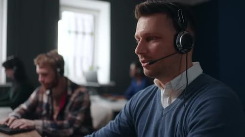 Call Center Agents Working in a Modern Office