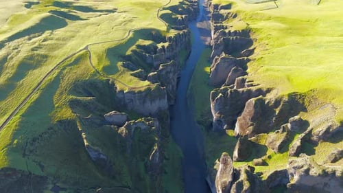 Top View of Tremendous Deserted Fjadrargljufur Canyon on a Sunny Summer Day