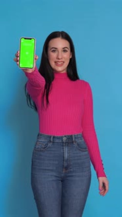 Smiling Woman with Smartphone Green Screen