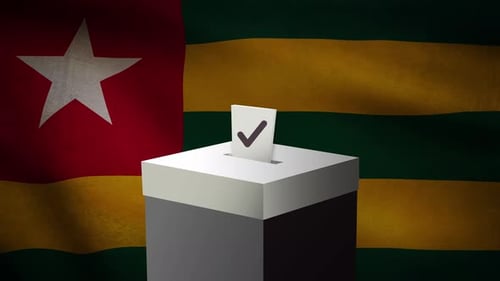 Casting Vote Into The Ballot Box During Togo Election