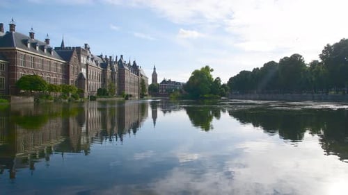 Hofvijver reflection, the Dutch parliament building with Den Haag city scape in the background and t