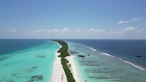 Sandbar of dhigurah island with sandy beach and blue water, Maldives. Aerial
