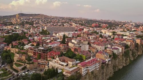Tbilisi City and Kura River at Sunset