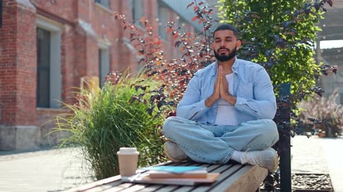 Indian Yoga Practitioner Making Namaste Gesture During Oudoors Meditation