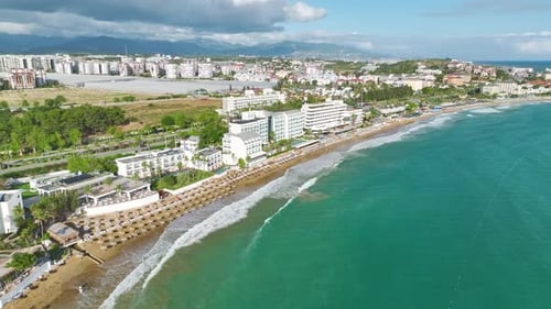 Aerial View Authentic Beach with Golden Sand and Colorful Umbrellas