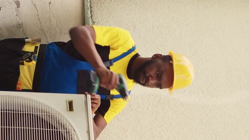 Vertical Video Servicemen Teamworking on Hvac System