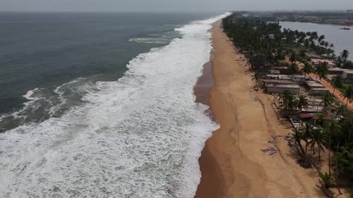 Aerial video over Grand Bassam Ivory Coast, on a sunny day.