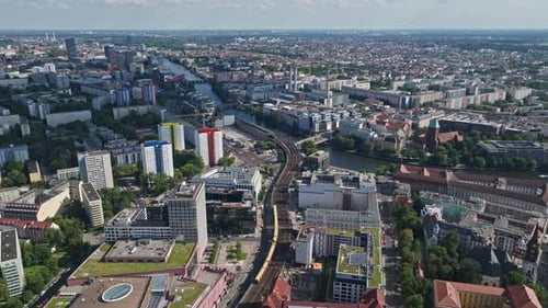 Aerial view of train crossing berlin Mitte district near spree river