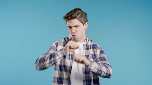 Active Positive Man Dancing on Blue Background Funny Dance Great Mood Vibes