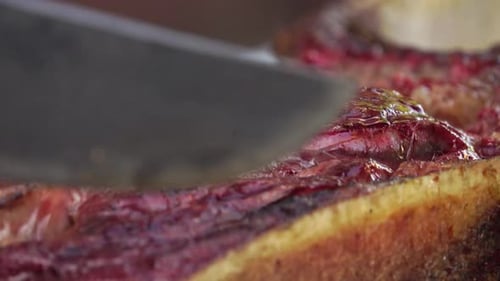 Close Up Beef Sliced on a Cutting Board