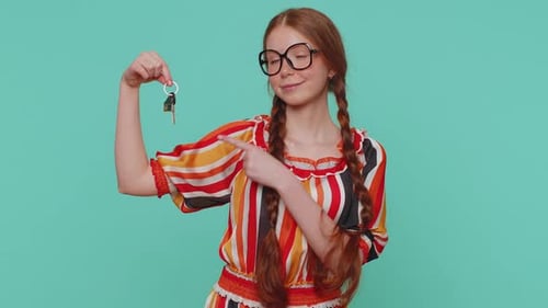 Redhead Girl Real Estate Agent Show Keys of New Home House Apartment Buying Property Mortgage Loan