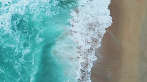 Beautiful Aerial Ocean Foaming Splashing on Empty Tropical Sand Beach. Turquoise Stormy
