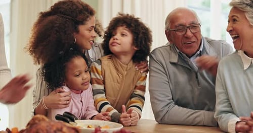 Happy Family Laughs Together at Home