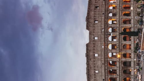 Rome Italy Colosseum Vertical Footage Video Traffic Near Flavian Amphitheatre During Sunset Evening