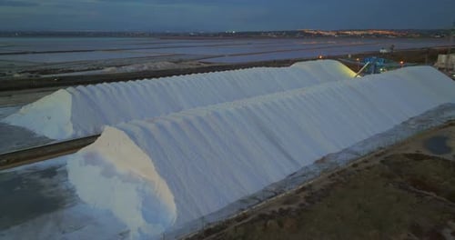 Aerial View of a Salt Flat Factory Besides the Sea Salt Extraction