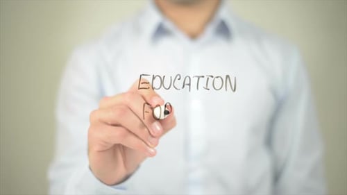Education for All Man Writing on Transparent Screen