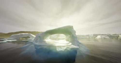 Beautiful Arctic Iceberg Floating on Water with Sun Rays