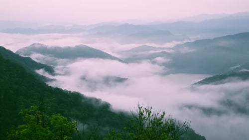 Misty Mountain Landscape at Dawn with Sea of Clouds in Taiwan Xindian Hills.