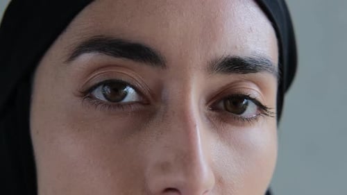 Close Up on Woman's Face with Head Covering