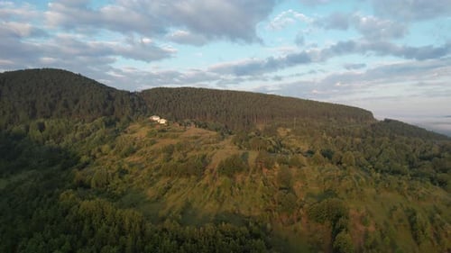 Forest Summit, spring forests, green mountain terrain, drone view of mountain ranges, majestic