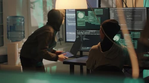 Young Adults at Computers in Urban Office