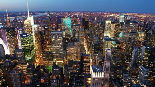 Aerial View of Illuminated Manhattan Skyline at Night