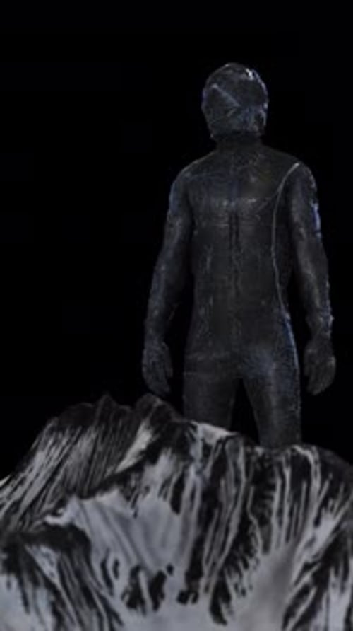 Robotic Man Standing Behind Snowy Mountain Vertical On Alpha Channel