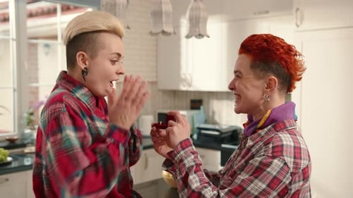 Woman Proposes to Her Girlfriend in the Kitchen