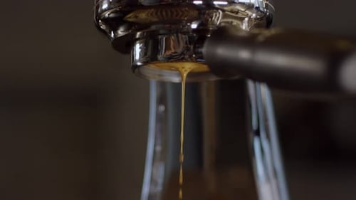 Close-up of Espresso Extraction in Glass