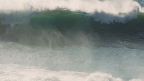 Huge wave broke with nobody riding it, at Praia do Norte in Nazare