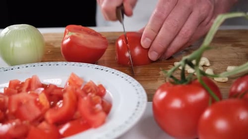 Chef Chopping Tomatoes