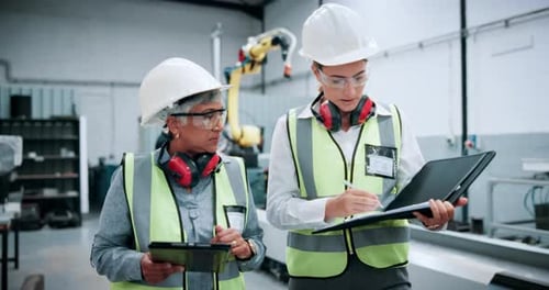Engineering, team and manufacturing with women in workshop for industrial