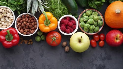 Fresh Fruits and Vegetables on Dark Background