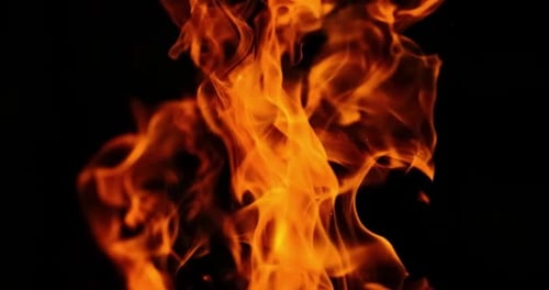 Dramatic Flames Burning Against Dark Background